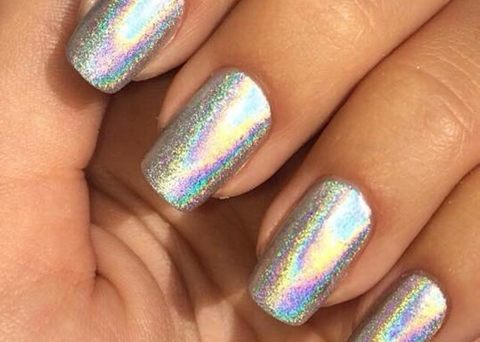 Chrome Nails How To DIY The Metallic Manicure Trend stearling silver metallic holographic nails