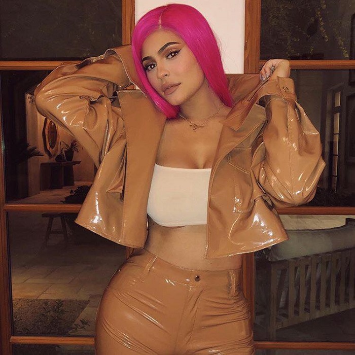 Sultriest Fashion Choices By Kylie Jenner nude patent leather jacket pants tube top