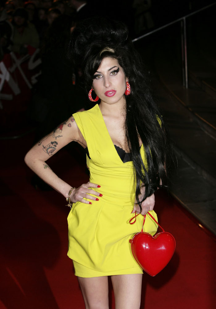 Amy-Winehouses-Iconic-Style-Still-Lives-On yellow dress