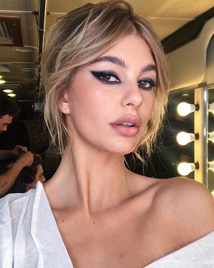 Celebrities-Are-Obsessed-With-Curtain-Fringe-This-Season-cami morrone