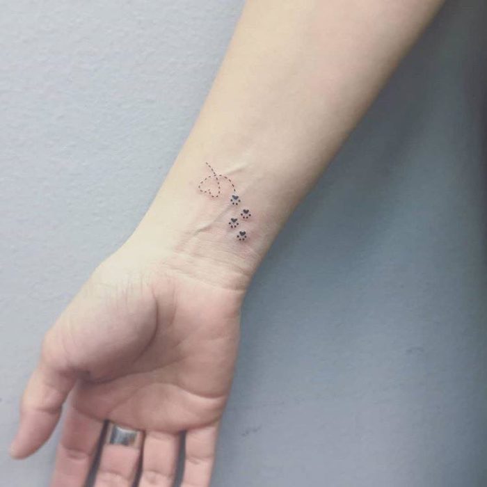 Cute Wrist Tattoo Ideas for Women heart paw prints