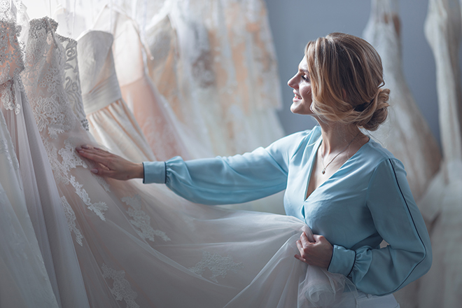 how-to-choose-a-bridal-gown-fashionable-bride-choosing-wedding-dress