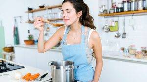 how-your-diet-can-effect-your-hair-woman-making-dinner