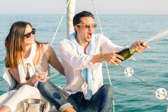 five-tips-getting-ready-for-your-blind-date-main-image-couple-on-a-boat-with-champagne