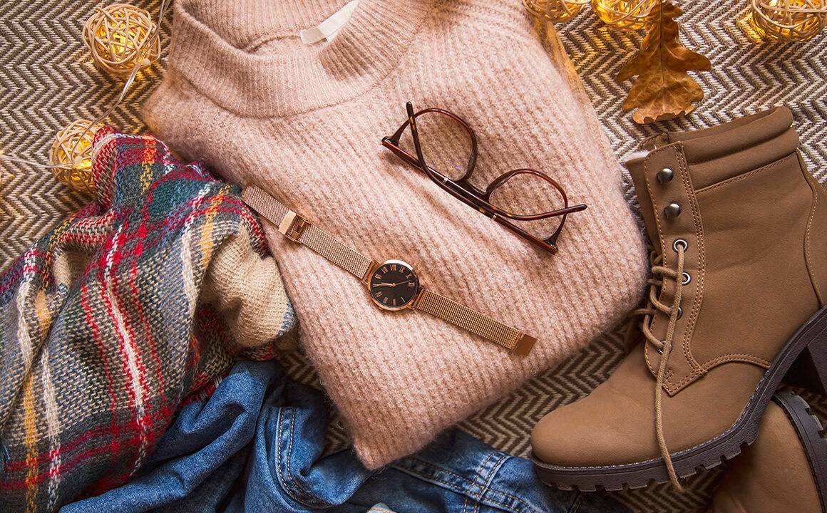 fall-fashion-guide-2020-edition-sweater-boots-watch-scarf-cute-fall-clothes-piled-up