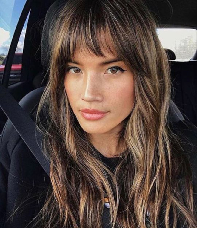 horoscope haircuts are a thing - check out what style you should get based on your zodiac sign - cancer - romantic wispy bangs
