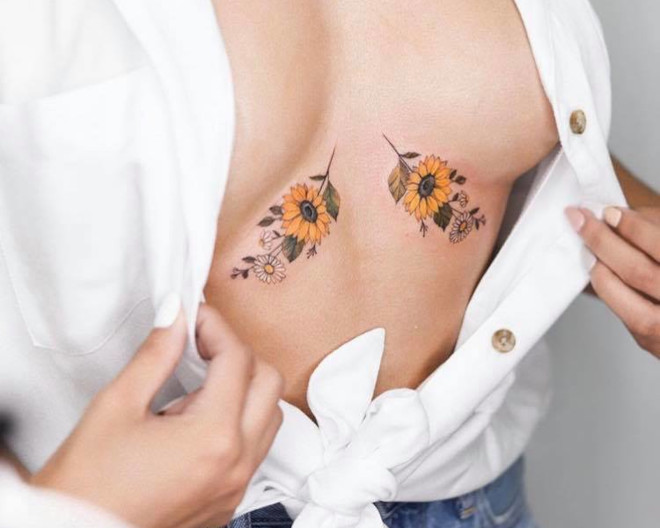 sternum tattoos to accent your décolletage