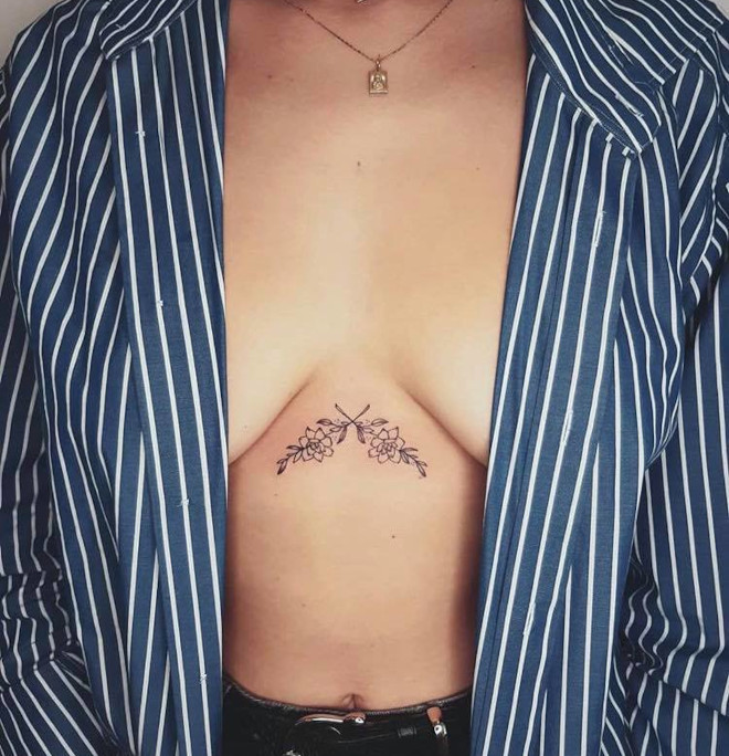 sternum tattoos to accent your décolletage