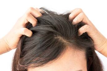 scalp-conditions-that-may-cause-itchiness-woman-scratching-head