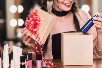 trending-christmas-ideas-for-her-woman-opening-present-box