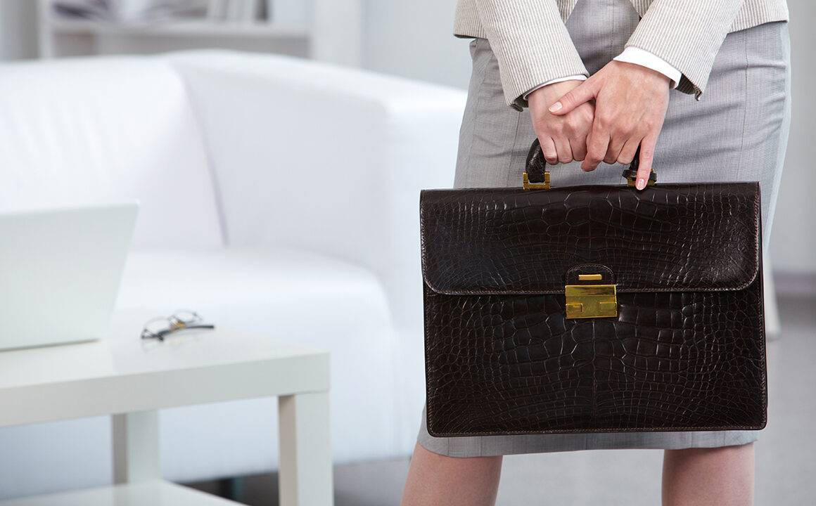find-the-right-leather-briefcase-woman-holding-case