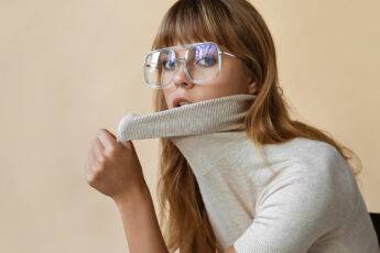 upcycle-old-clothes-into-something-new-woman-in-vintage-clothing-turtle-neck-glasses