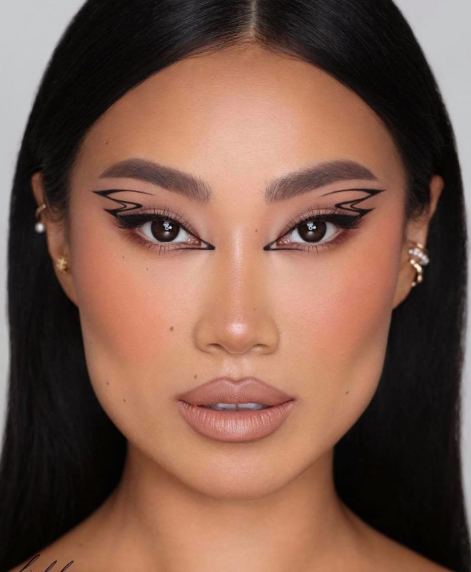 the double wing makeup trend Is here to make your eyes pop