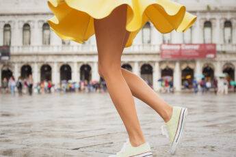 how-to-finance-your-next-shopping-spree-happy-girl-in-yellow-dress