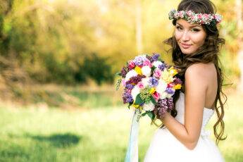 best-bridal-bouquet-options-bride-holding-her-flowers