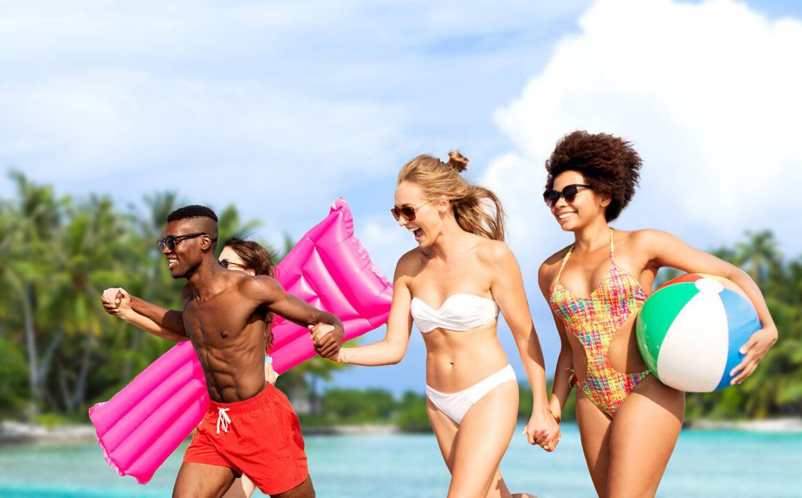vacation-hair-fashion-group-of-friends-running-on-beach-main-image