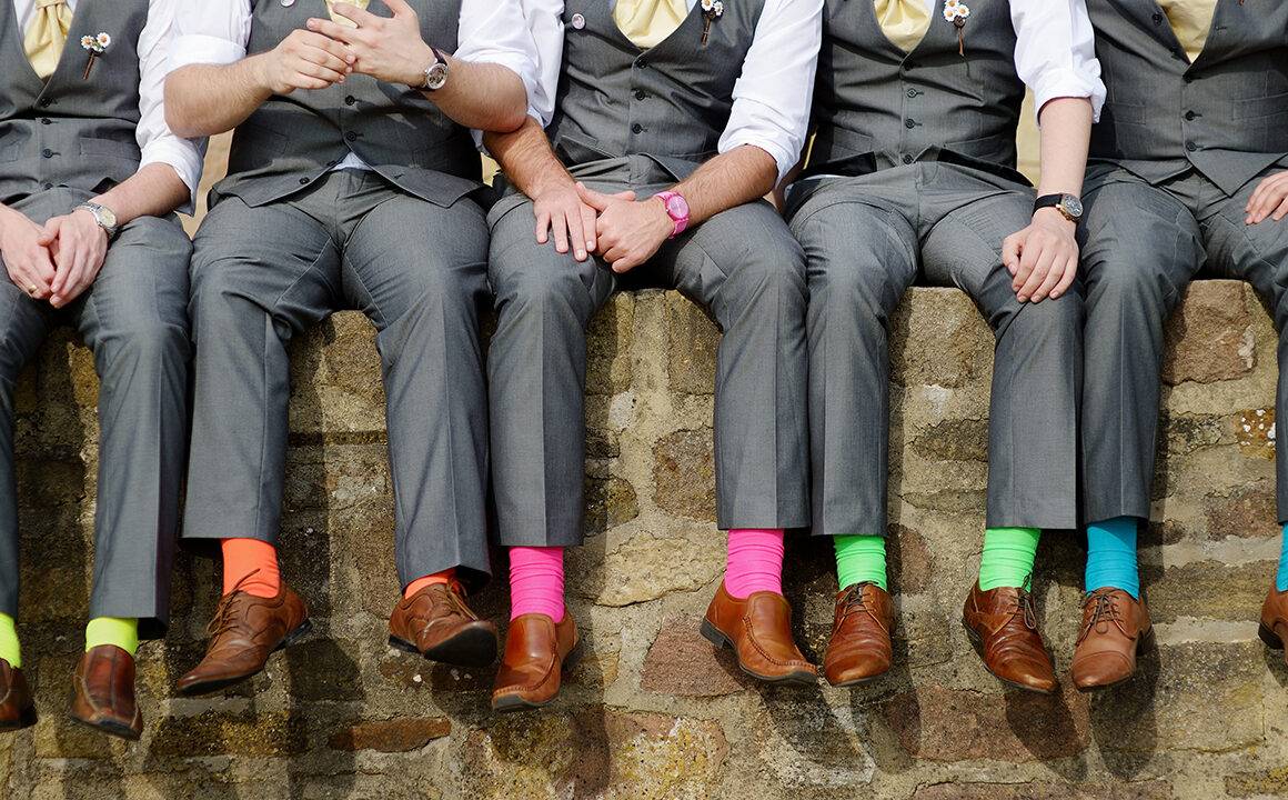 reasons-to-start-wearing-fun-socks-men-all-wearing-bright-socks