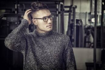 how-to-look-fashionable-without-spending-money-stylish-man-in-sweater-and-glasses