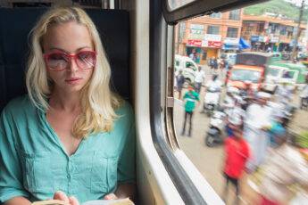 stylish-sunglasses-for-women-that-are-forever-in-vogue-woman-on-train