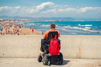 man-on-wheelchair-on-the-beach