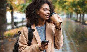 staying-safe-while-dating-online-beautiful-woman-with-coffee-on-phone-1000x600