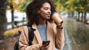 simple-ways-to-improve-your-outfit-woman-holding-cup-of-coffee