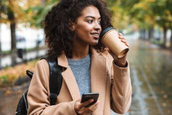 simple-ways-to-improve-your-outfit-woman-holding-cup-of-coffee
