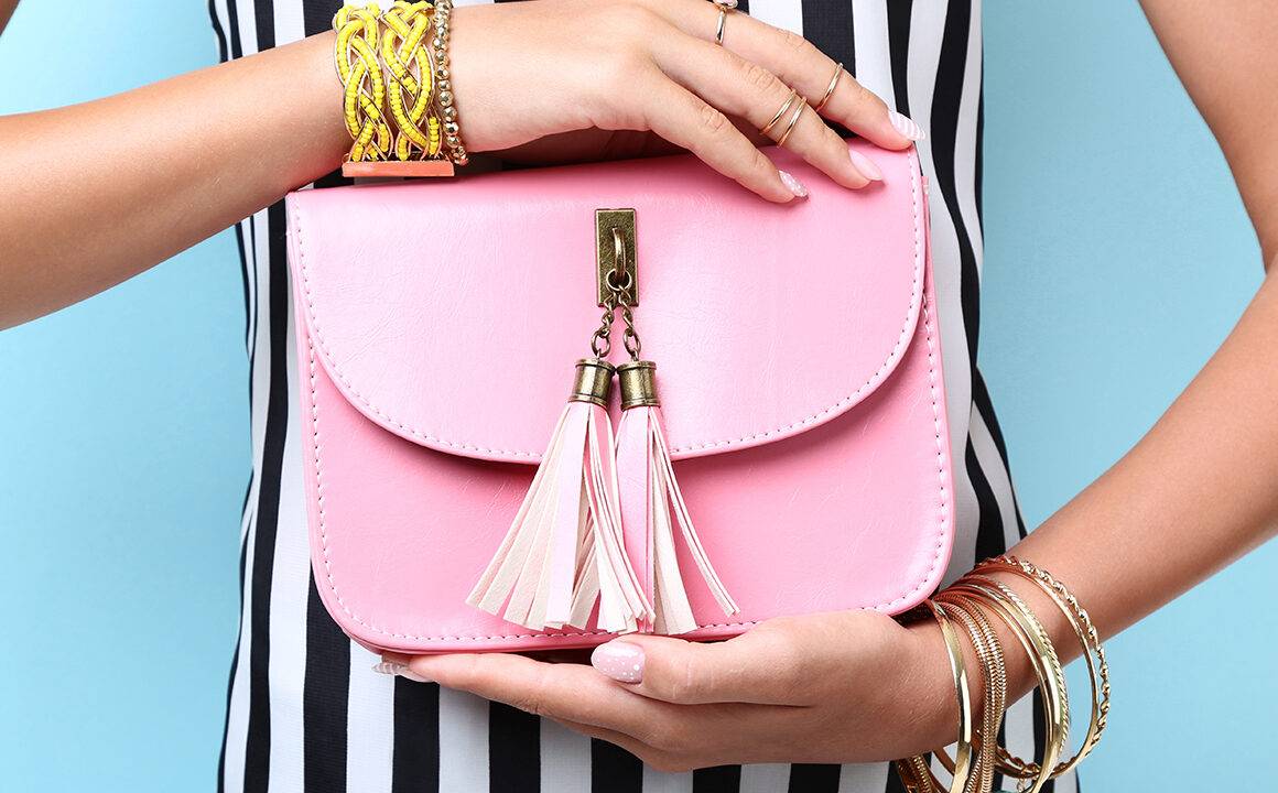 easy-ways-to-update-your-wardrobe-for-spring-woman-holding-cute-pink-bag