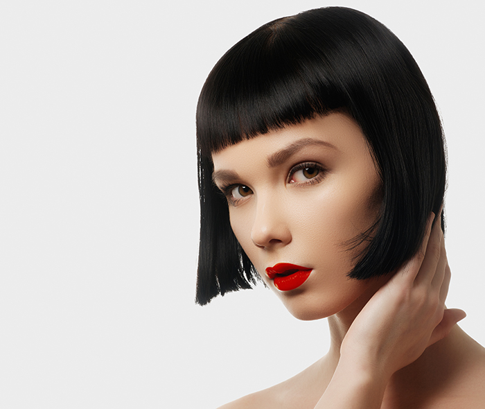 woman-with-nice-skin-red-lips-and-french-bob-haircut-main