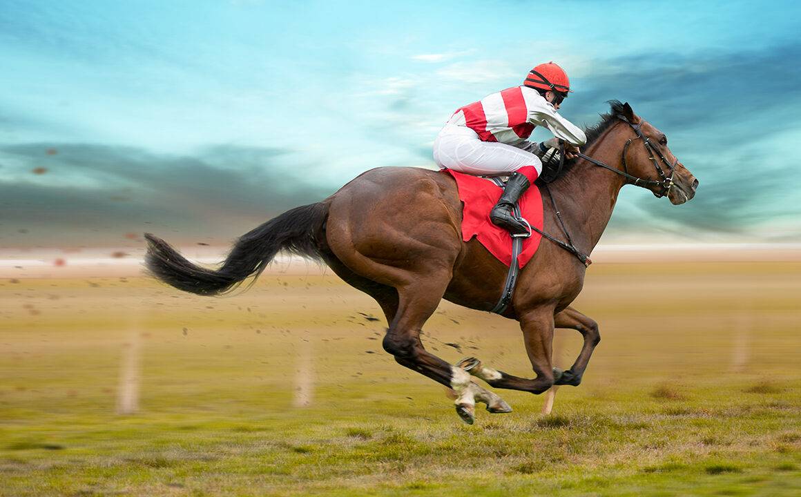 how-do-jockeys-choose-their-colors-main-image-jockey-racing-on-horse