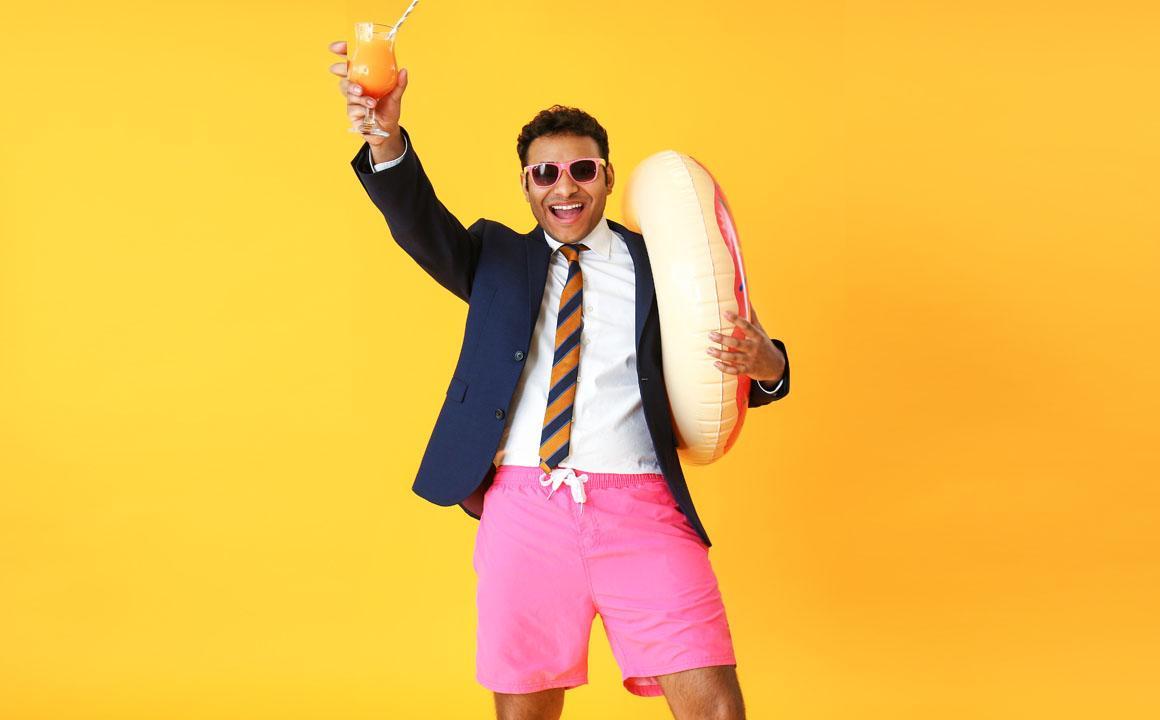 pink-swim-shorts-happy-man-drinking
