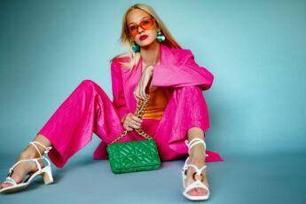 white-shoes-green-bag-earrings-pink-suite-blonde-shades