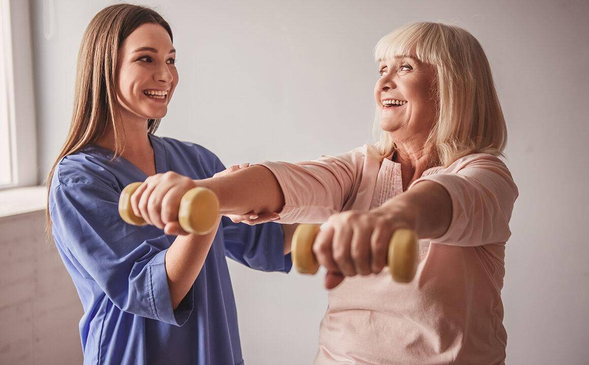finding-care-for-elderly-relatives-woman-helping-older-woman-work-out