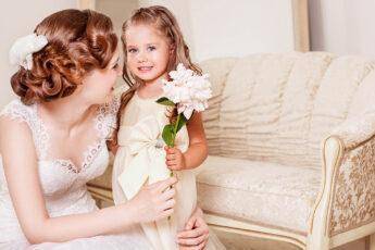 gifts-for-flower-girl-smiling-flower-girl-with-bride-wedding