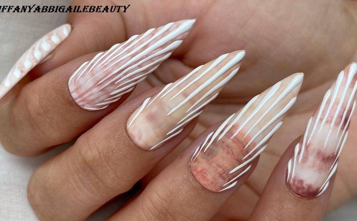 Mermaid Vibes Enhance Your Look with Stunning Seashell Nails