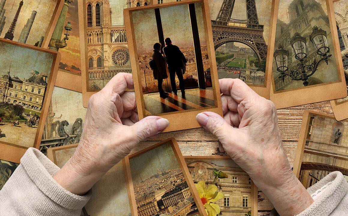 create-the-perfect-memory-gallery-man-holding-pictures-memories-collage-frames
