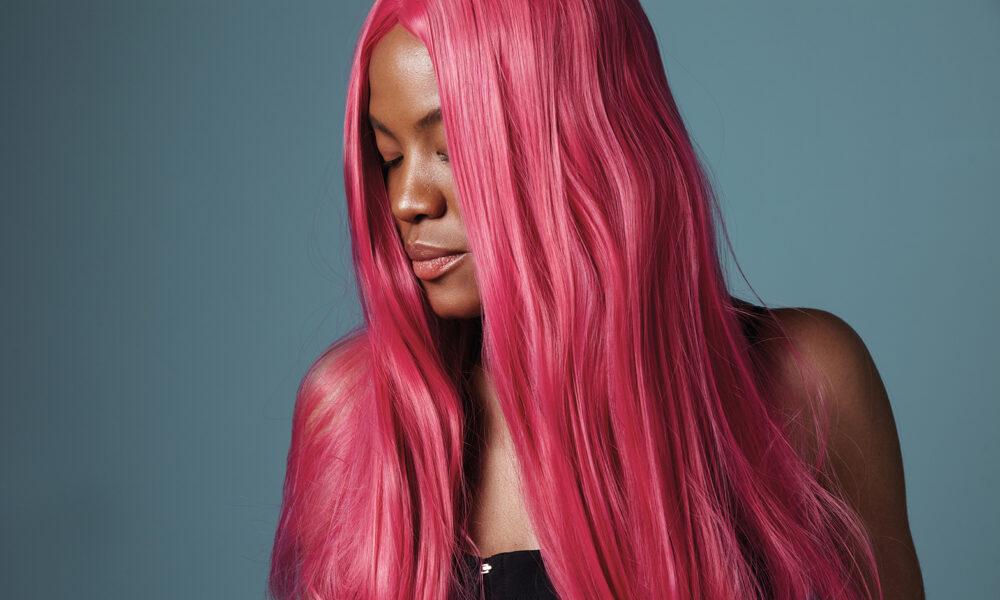 ultimate-guide-to-wigs-past-and-present-beautiful-girl-in-pink-wig