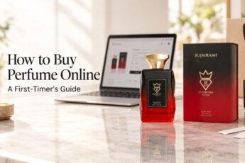 lap top with a perfume bottle